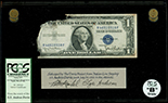 USA, $1 silver certificate, series 1935D, serial R81178009F, Clark-Snyder, in lucite display, PCGS Currency Grade B.